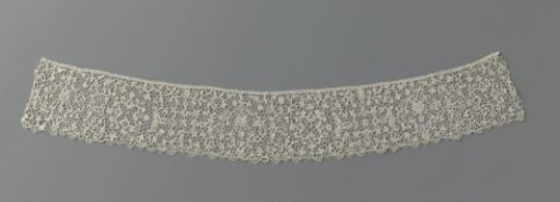 Strip of needle lace with three medallion motifs and vines