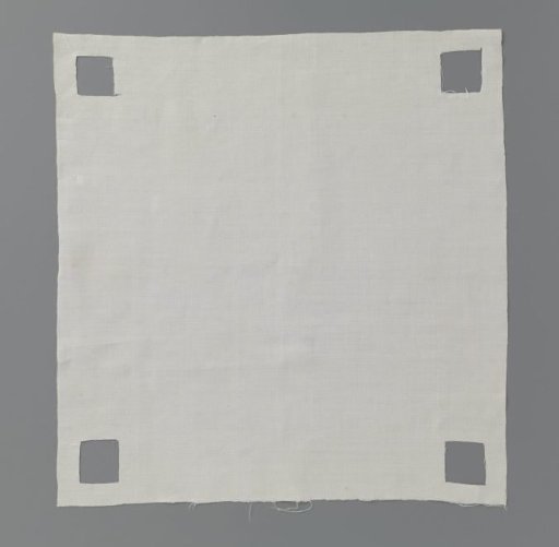 Torn, linen center piece of handkerchief