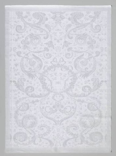 Napkin of linen damask with a floral pattern