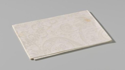 Napkin of linen damask with a floral pattern