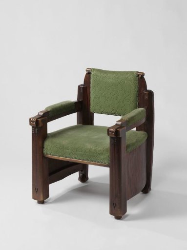 Armchair upholstered in green wool with armrests ending in animal snouts