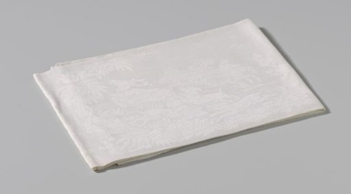 Linen damask napkin with a coat of arms