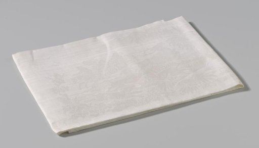 Linen damask napkin with a coat of arms