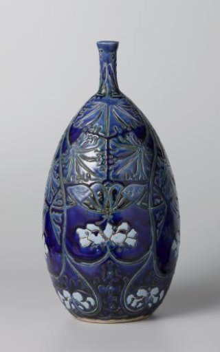 Vase decorated with flowers, leaves and butterflies