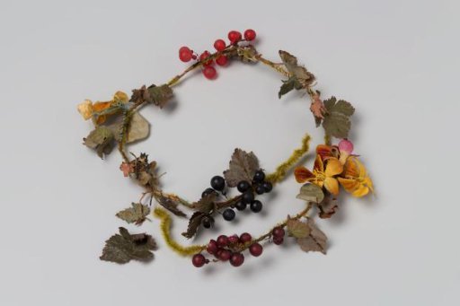 Wreath with Yellow Flowers, Red and Black Berries, and Green Leaves