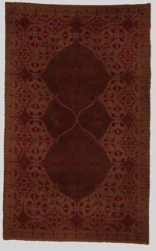 Carpet with an arabesque pattern and butterflies