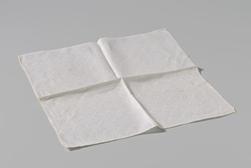 Fragment of a napkin or tablecloth with a cross-stitch pattern