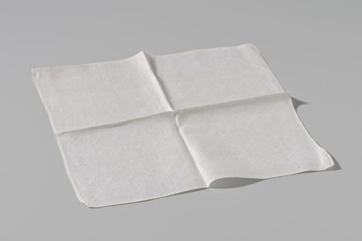 Fragment of a napkin or tablecloth with a cross-stitch pattern