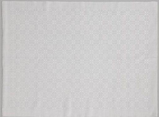 Napkin of white linen with a pellet pattern