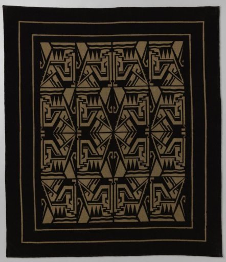 Tablecloth of printed calico in black and beige with an Art Deco pattern