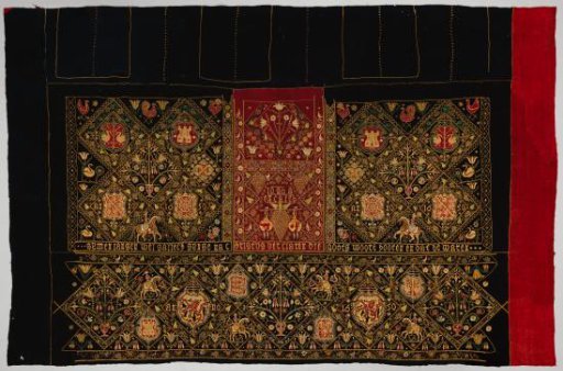 Apron of black and red wool, embroidered and appliquéd with silk, decorated with diamond patterns and coats of arms