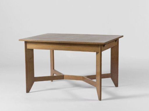 Table resting on four legs placed diagonally