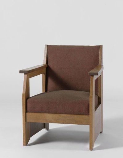 Armchair with broad side panels and upholstered in red wool