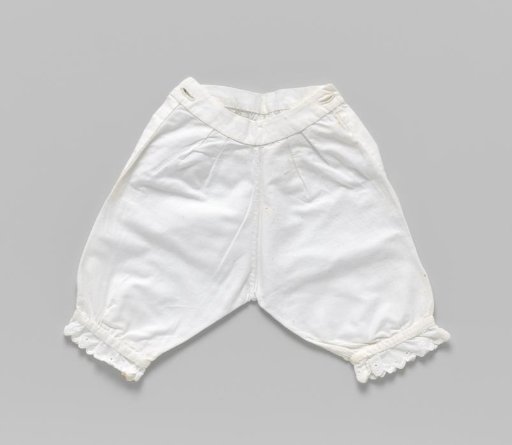 Breeches of cotton, with long gathered legs with stripe and button fastening