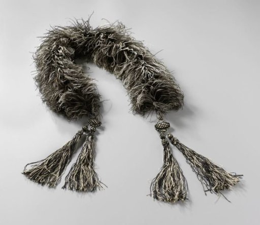 Boa of white and brown-black ostrich feathers with white and black silk tassels at the ends