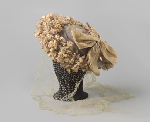 Hat of lilac silk tulle with lilac velvet ribbon, light grey voile with violets among others