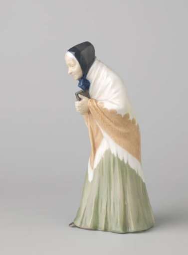 Decorative porcelain object in the form of an old woman with a book