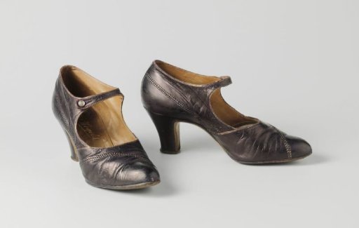 Lady's shoe of gold morocco leather with ankle strap bound with gold thread