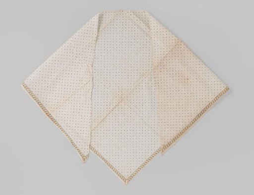 Fichu, triangular, of cotton printed with black dots and a border of yellow apples
