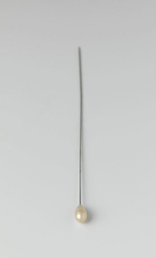 Hatpin with a round white Bakelite knob