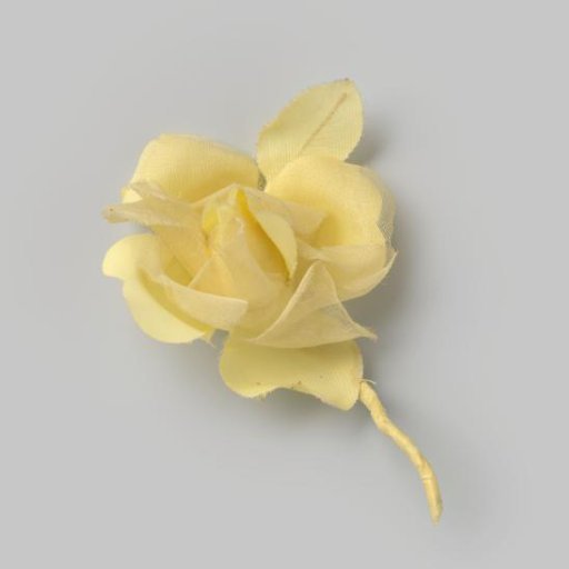 Corsage in the shape of a yellow rose