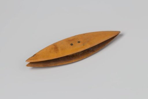 Wooden boat for bobbin lace work, with a small wooden block between the two discs, held together by copper pins