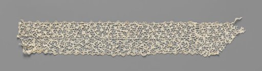 Strip of needle lace with floral motifs