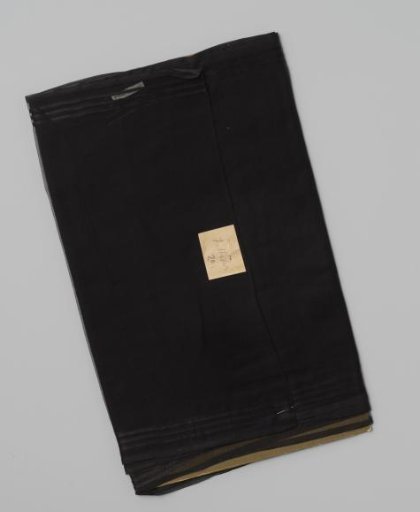Coupon of black parasol gauze bordered on both sides with three black satin stripes