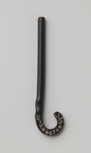 Handle for an umbrella or parasol of black plastic