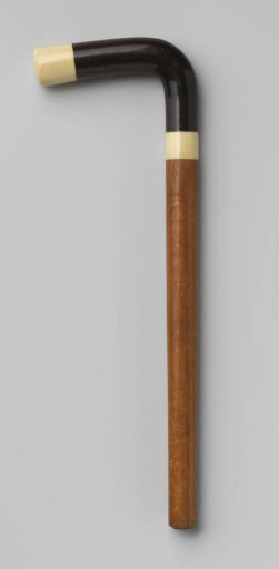 Handle of wood with an L-shaped knob of black horn, set between two pieces of ivory