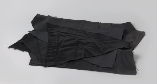 Fragment of plain black silk satin