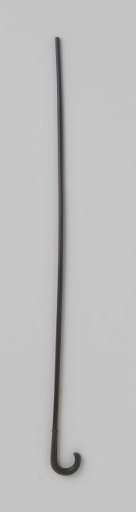 Handle of an umbrella or parasol of black painted wood with a round hook, in which a leaf motif is carved