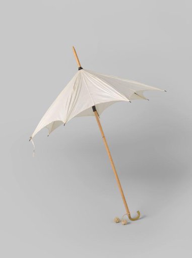 Parasol with canopy of plain white cotton, on a light wooden shaft, with a horn hook attached