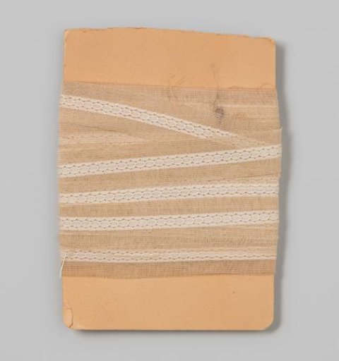 Ribbon, cream, with cream-colored needlework