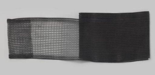 Metreage ribbon of black silk gauze, with a woven pattern of alternating larger and smaller circles in interlocking bands