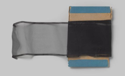 Measuring strip of plain black silk gauze