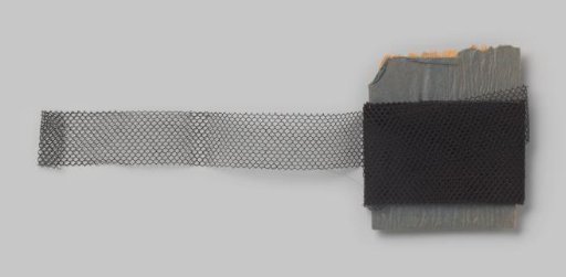 Board with a black ribbon of silk tulle