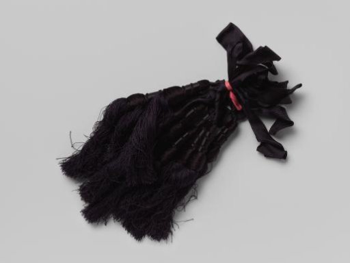 Nine silk tassels on a braid in navy blue