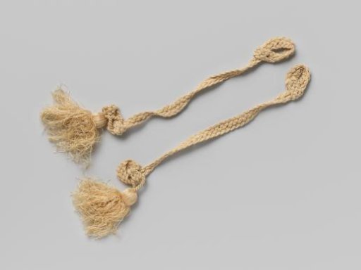 Two beige silk braids with tassels