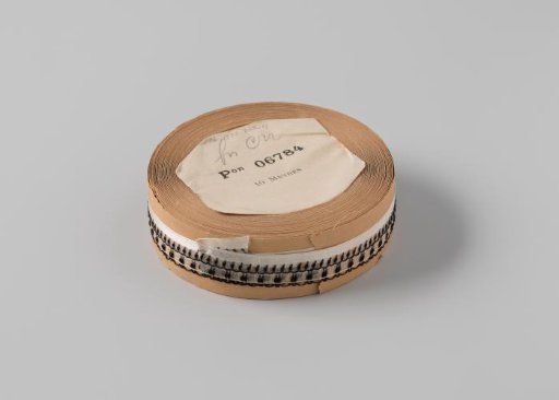 Ribbon on a roll, lilac gauze ribbon with two rows of black shells
