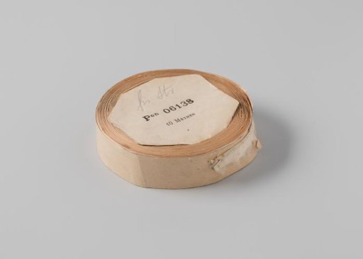 Roll with white satin ribbon with one frayed side