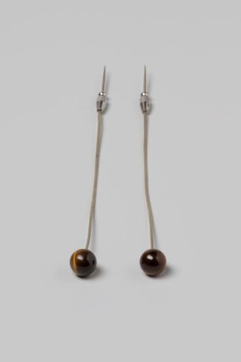 Hatpin with a round tiger's eye ball and a steel pin, fitted with a slide
