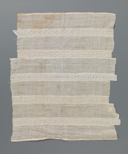 Piece of batiste with embroidery lines and the initials I.Z.R and five insertions of bobbin lace with two stylised mirrored flowers between vertical lines and ovals