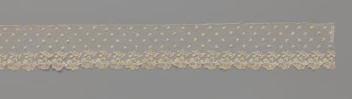 Strip of appliqué lace with a scalloped edge of hanging carnations
