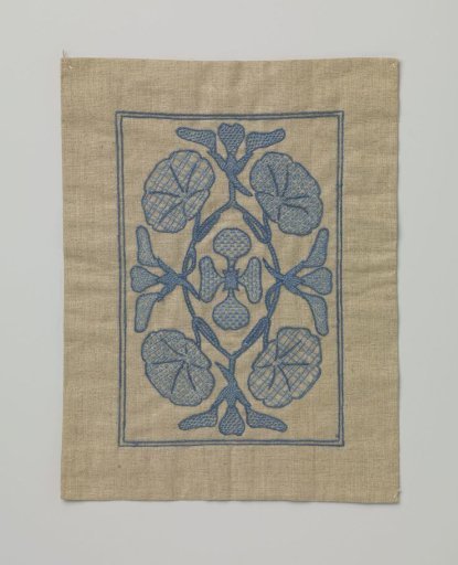 Craftwork with embroidered blue flowers