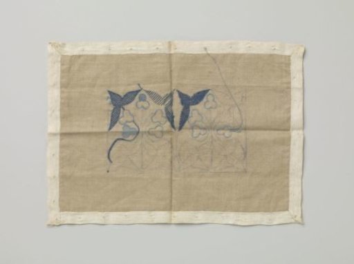 Craftwork with embroidered blue cornflowers