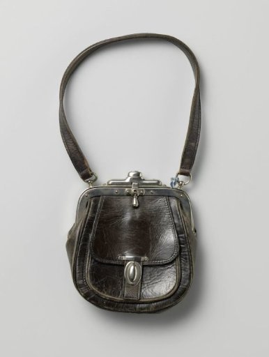 Bag of black leather with a nickel handle and clasp, with a leather strap