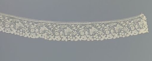 Strip of bobbin lace with butterflies