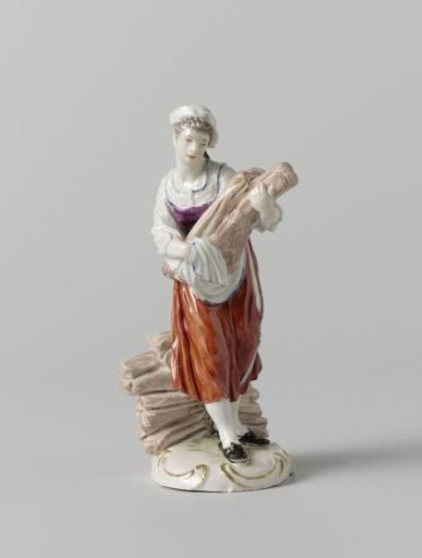 Figure of a woman carrying lumber
