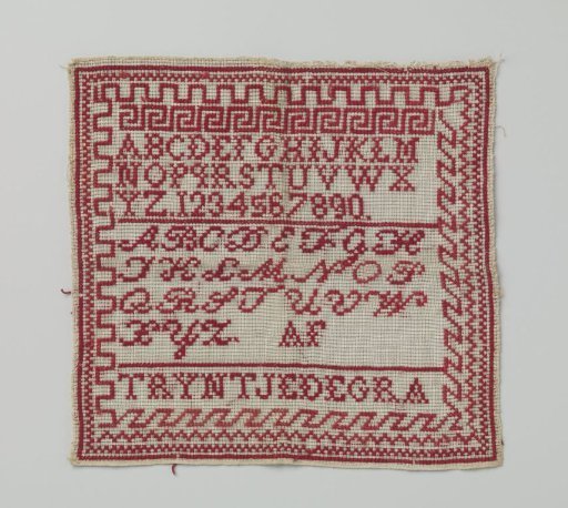 Sampler and Patch with Red Embroidery.